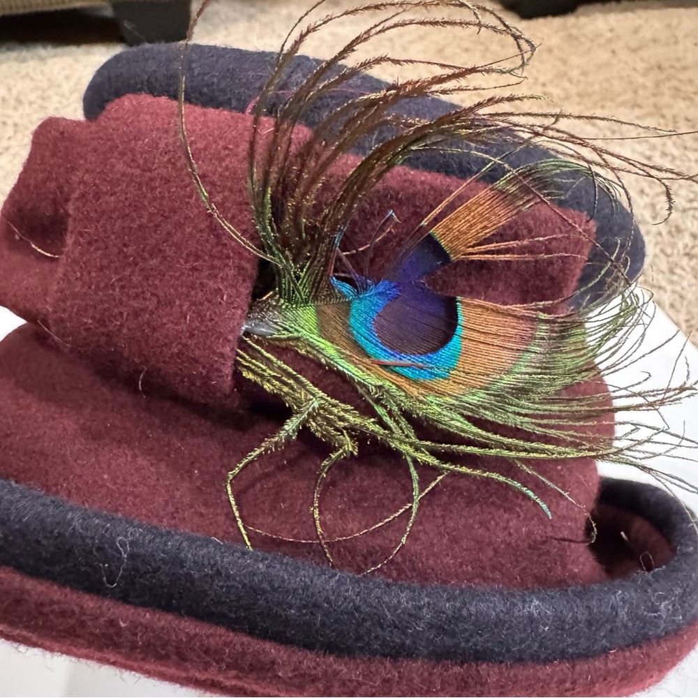 Elegant Burgundy Hat with Peacock Feather Accent